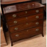 A George III mahogany chest of four drawers on bracket feet