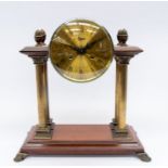 A large mid 20th century, mahogany, 8-day, Continental mantel clock by Urgos with Roman numerals,