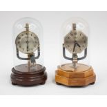 Two 1930-1950's domed mantle clocks, powered by Electrical currents