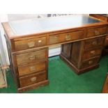 Early 20th Century slim pedestal oak study writing desk, green leather writing surface, three top