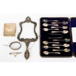 A collection of silver and white metal items to include; a cased set of twelve Sheffield silver