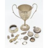 A quantity of silver to include; A London silver two handled trophy engraved "The Walters Junior