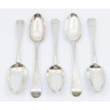 A set of six George III Irish silver Hanoverian table spoons, each engraved with a crest, hallmarked