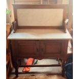 An early 20th century pine and marble washstand.