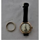A 9ct gold Art Deco period wristwatch on a leather strap. Untested but watch winds and appears to