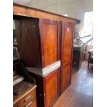 Victorian revival  mahogany and satinwood compact wardrobe, in a breakfront shape dental cornice,