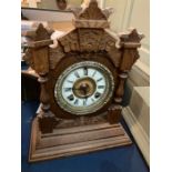Late 19th century carved oak mantle clock