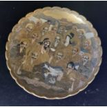 A Japanese Satsuma dish painted with Immortals and dragon, scalloped border, Meiji period, the