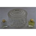 A Lalique frosted glass powder bowl and cover "Enfants cherubs", signed to base 8,5cm h x 11cm