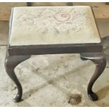 A George III revival mahogany dressing stool, tapestry stuffed seat, raised on cabriole legs and
