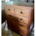A late Victorian mahogany chest of drawers, rectangular curved edge shape, slight oversailing top,