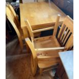 A recent beech kitchen table and chairs.