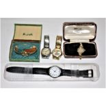 A collection of watches. Featuring a 9ct gold 1950s Hirco watch head, with partial yellow metal