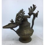 An Indian bronze lamp. H:26cm