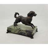 A French bronze and marble ink stand, the ink well fashioned as a leaping spaniel, with hinged