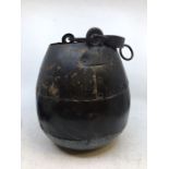 An Asian iron cooking pot. H:23cm