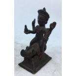 An Indian bronze figure of a deity. H:8.7cm
