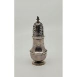 A George I silver baluster form sugar caster, by Thomas Bamford, London 1725, having pull-off