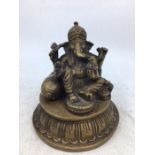 An Indian bronze figure of Ganesh. H:10cm