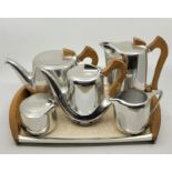 A Picquot Ware five piece tea and coffee service with kettle and tray. (7)