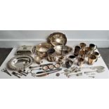 A collection of silver plated tableware, to include: grape scissors, entree dish and cover, swing