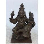 An Indian bronze figure of a deity. H:8.6cm