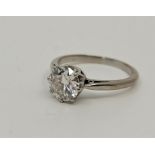 A precious white metal diamond solitaire ring, set round brilliant cut diamond (stone approx. 8mm