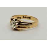 An 18ct. gold diamond gypsy ring, set single brilliant cut diamond (EDW 0.65 carats), size UK R 1/2.