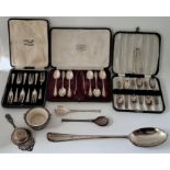 A set of six silver teaspoons with sugar nips, by Harrods Stores Ltd, London 1915, in Harrods fitted