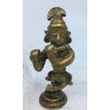 A small Indian bronze figure of a deity. H:7.2cm