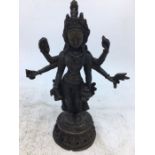 An Indian bronze figure of a deity. H:13.5cm