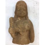 An Indian carved stone figure of a deity. H:18cm