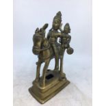 An Indian bronze figure of a deity on a horse. H:17.8cm