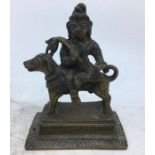 An Indian bronze figure of a deity. 9.6cm