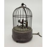 An early 20th century French singing bird automaton, having two song birds with moving beaks,
