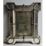 A Venetian wall hanging mirror, the rectangular plate flanked by leaf and flower etched bevelled