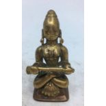 A small Indian bronze figure of a deity. H:6cm