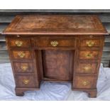 A George I style kneehole desk