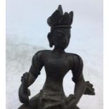 An Indian bronze figure of a deity. H:8.7cm