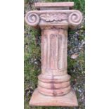 A pair of 20th Doric wooden capitals