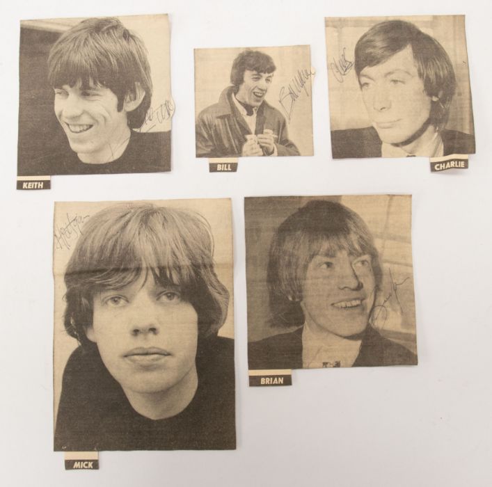 Rolling Stones - Autographed / Signed Newspaper Cuttings of the Band Members from the 1960s. The