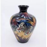 Moorcroft Pottery: An "Apollo Butterfly" patterned vase, dated 2005 and signed to base. Approx. 18.