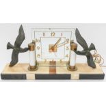 A 1930's Art Deco mantle clock with square mirrored face, marble base lamp, seagull detail to each