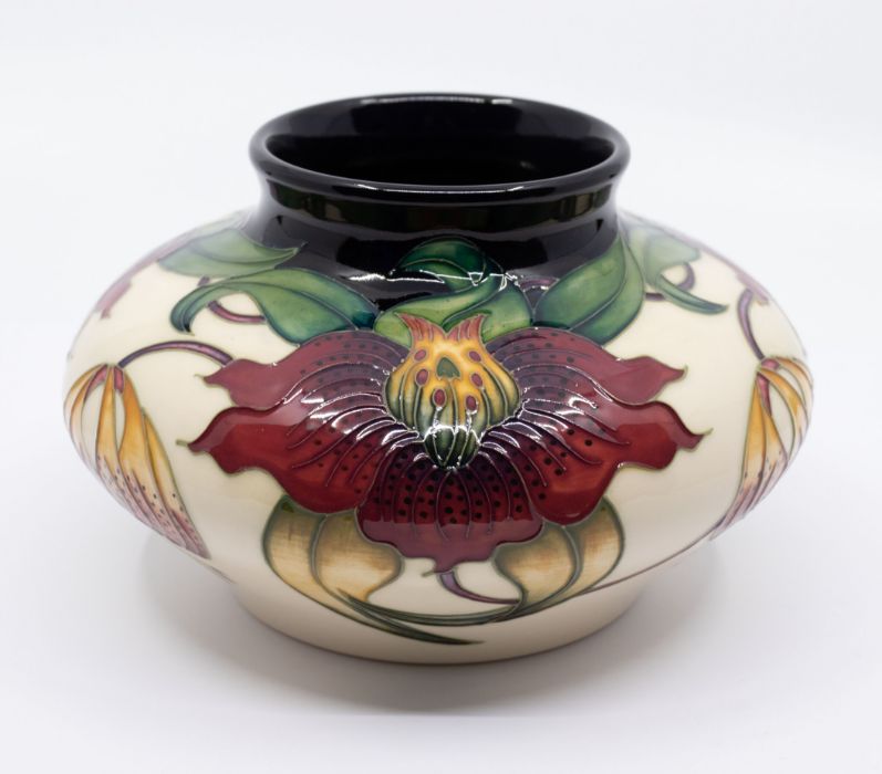 Moorcroft Pottery: An "Annalily" patterned vase, dated 1998, signed to underneath.  Approx. 11.5cm - Image 2 of 3