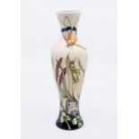 Moorcroft Pottery: A "Grass Hopper" patterned vase by Hugh Edwards, signed and dated 2011. In