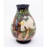 Moorcroft Pottery: A "Hare and Tortoise" trial vase, signed and marked to underneath. In box.