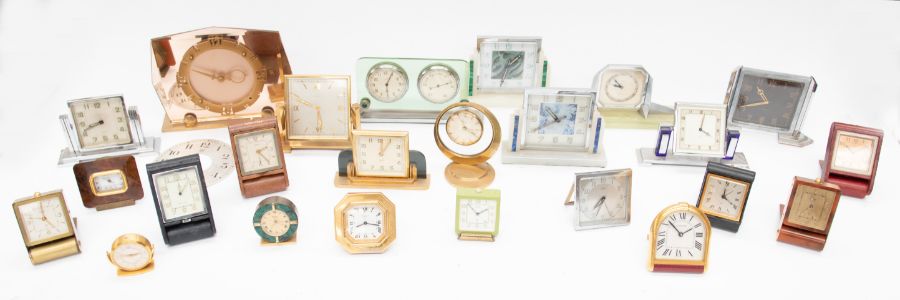 A collection of early to late 20th Century clocks, to include; Cartier, Le Coutre, Tiffany & Co,