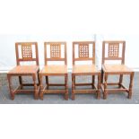 Robert 'Mouseman' Thompson - Four Oak lattice backed dining chairs, with leather seats, each with