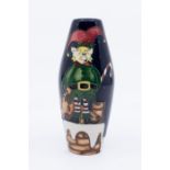 Moorcroft Pottery: A "Christmas Elf" patterned small vase, dated 2011, in box, approx. 13cm high.