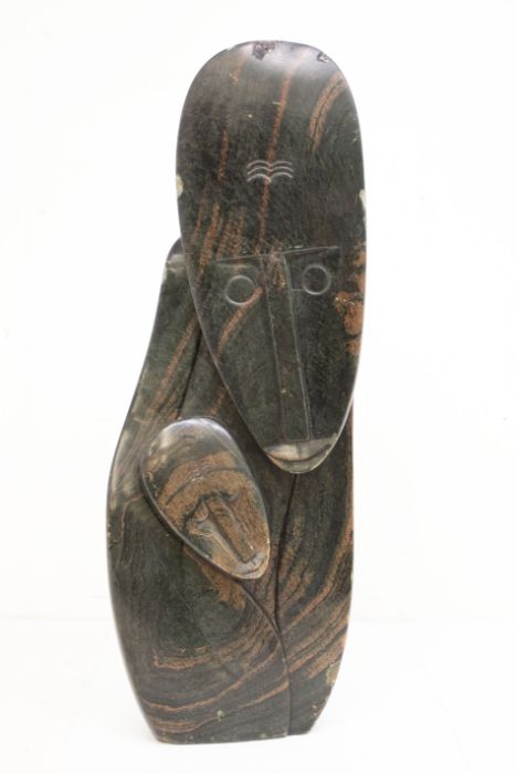 Phinear Kamangira (Zimbabwe, circa 1987) A carved hardstone of a mother holding sleeping child,